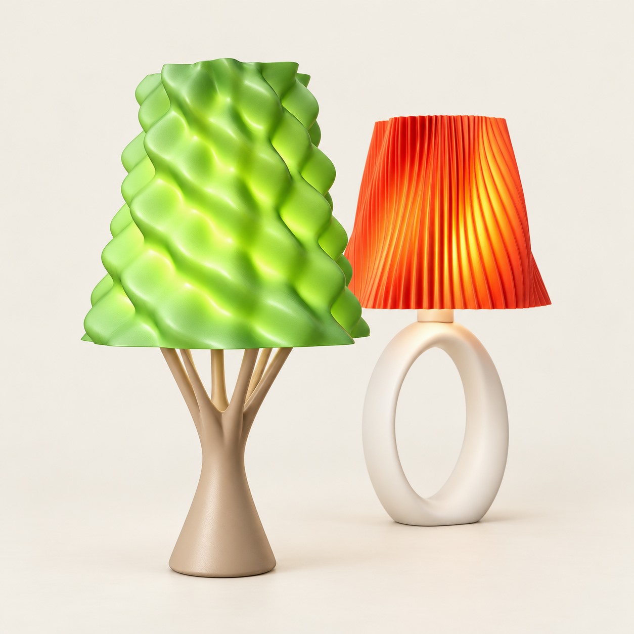 Two complete sculptural lamps with expressive green and vermilion shades
